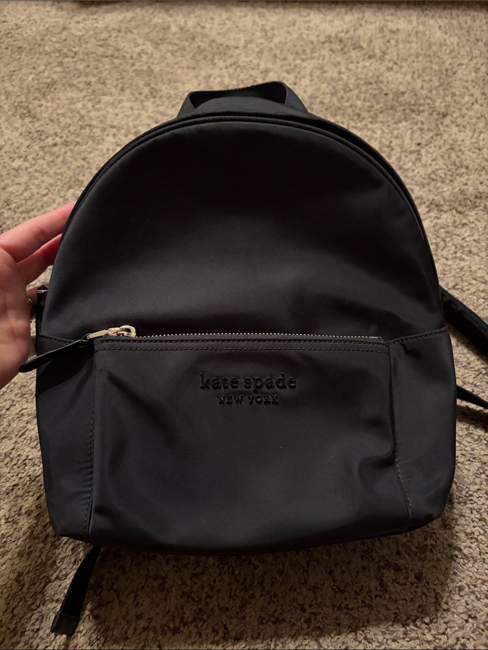 kate spade black backpack with front zip pocket